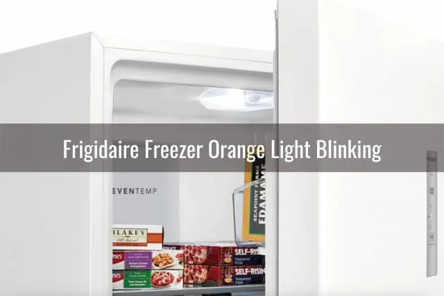White Frigidaire with frozen food inside