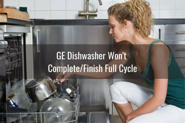 Woman putting plates in the dishwasher