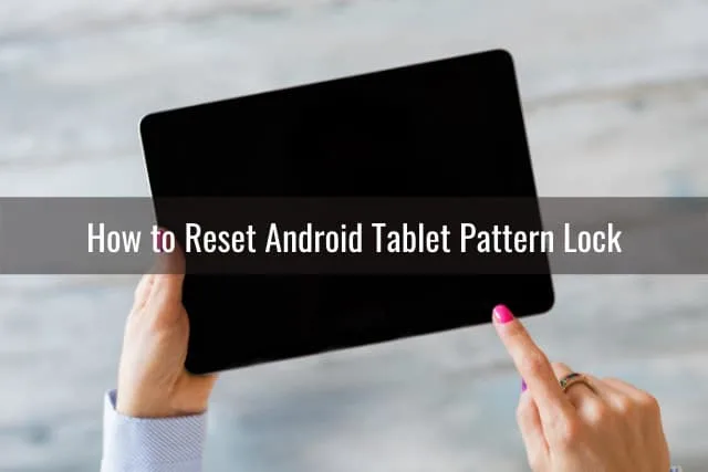 Hold a black tablet