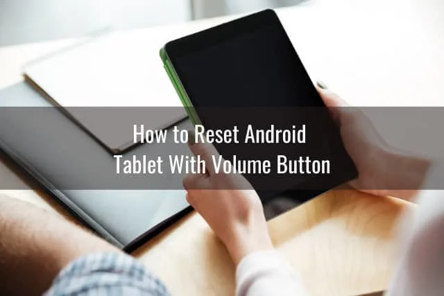 Hold a black tablet