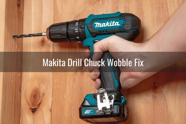Man using drill in the wood