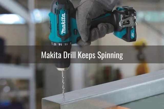 Man using drill in the metal