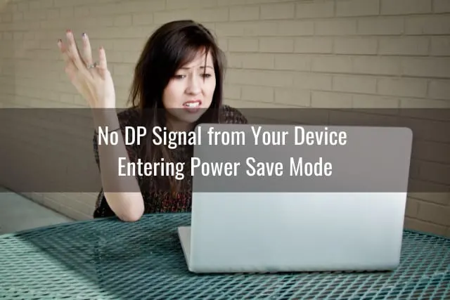 Frustrated woman holding a laptop