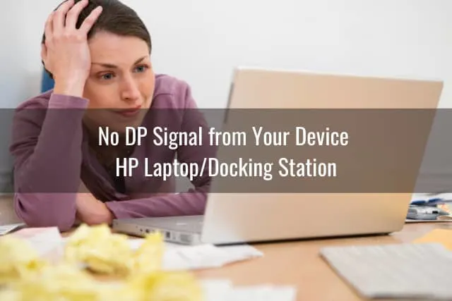 Frustrated woman holding a laptop