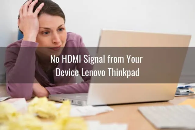 Frustrated woman holding a laptop