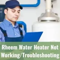 Water heater repair man looking at clipboard