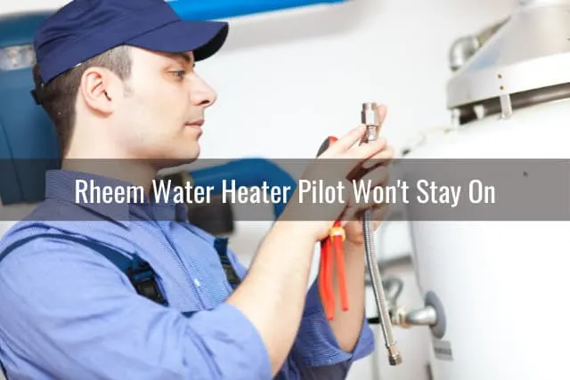 Man fixing water heater