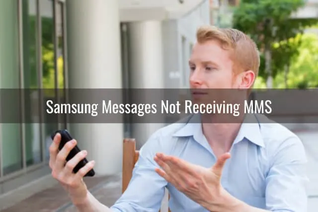 Confused man looking at her phone