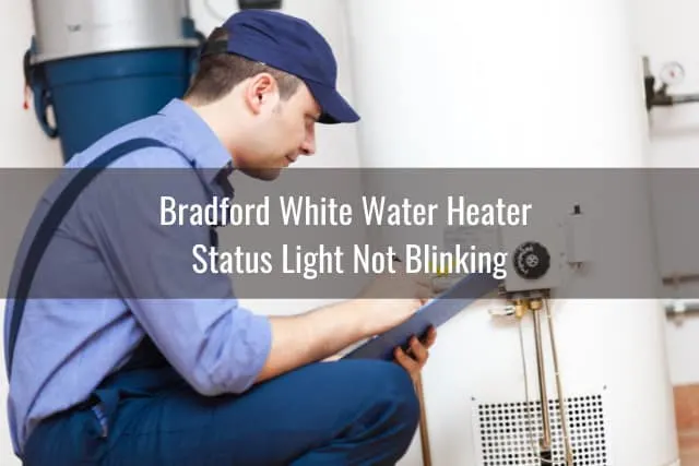Man fixing the water heater tank