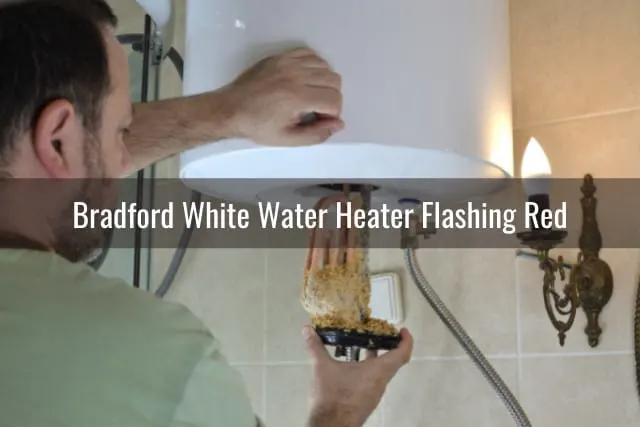 Man fixing the water heater tank