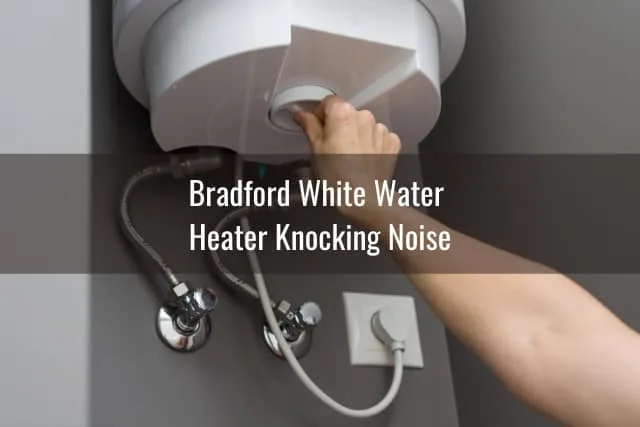 Woman adjusting water heater