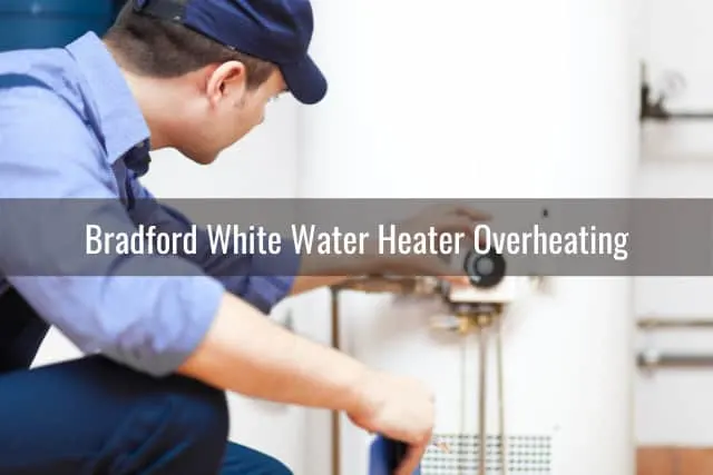 Man fixing the water heater tank