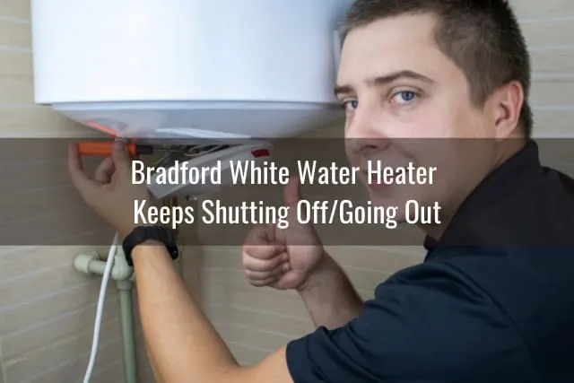 Man fixing the water heater tank