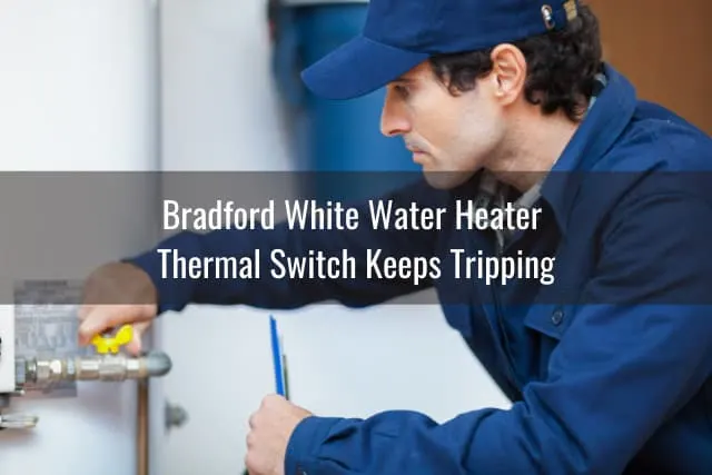 Man fixing the water heater tank