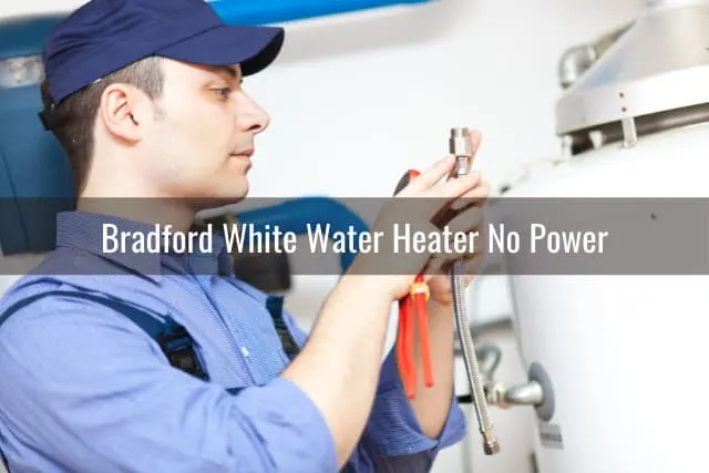 Man fixing the water heater tank