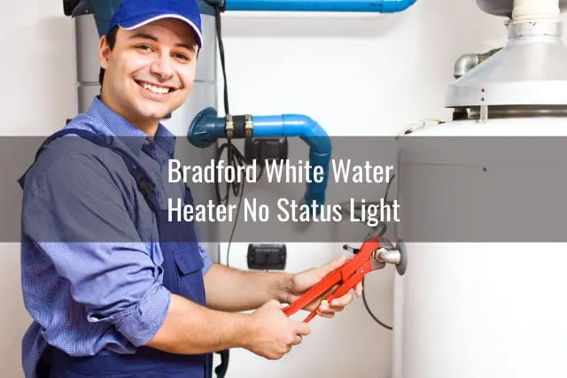 Man fixing the water heater tank