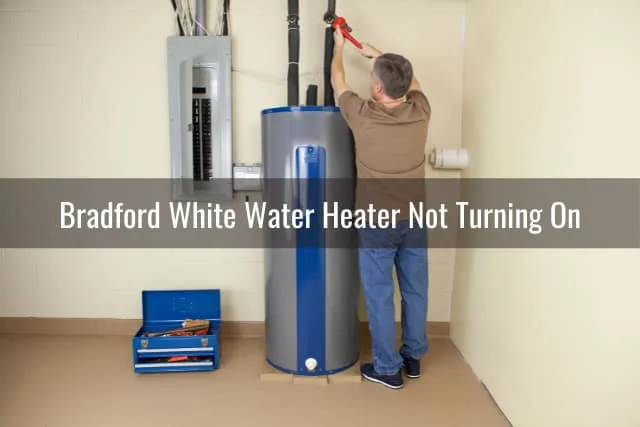 Man fixing the water heater