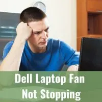 Confused man looking at his laptop