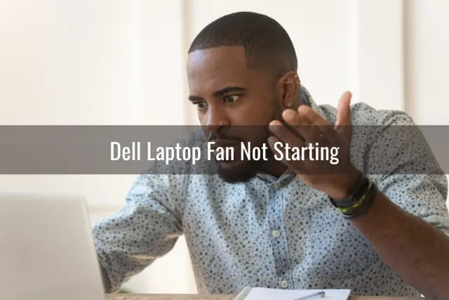 frustrated man looking at her laptop