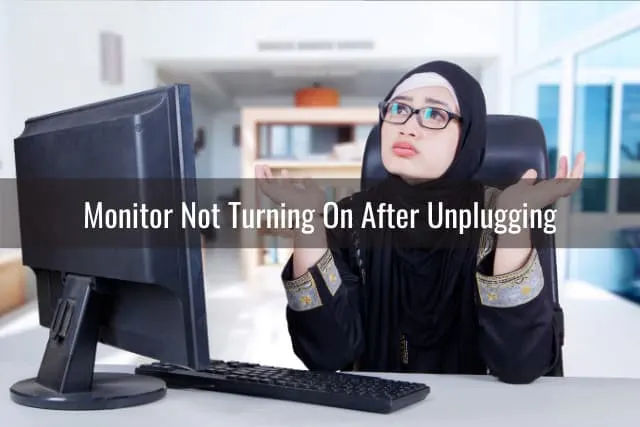 Frustrated woman looking at her monitor