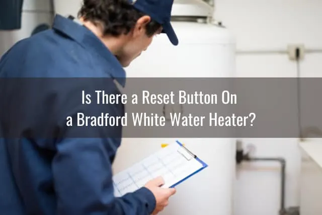 Man checking the water heater tank