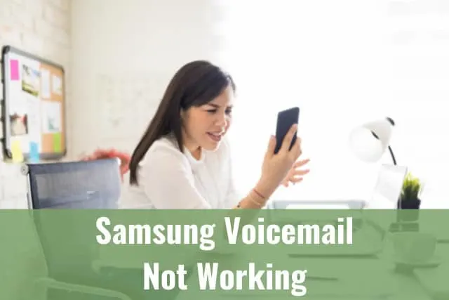 Frustrated woman looking at her phone