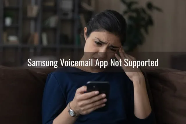 Frustrated woman looking at her phone