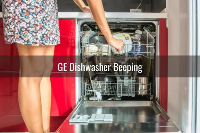 Woman putting plates on the dishwasher
