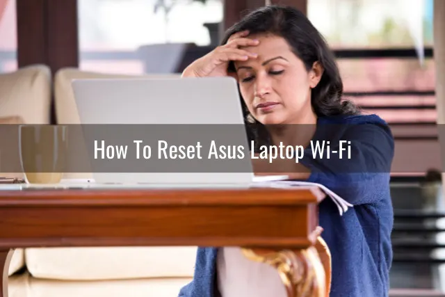 frustrated woman looking at her laptop
