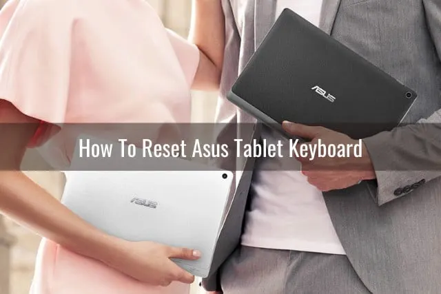 Holding Black Tablet