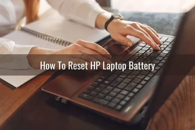 Using black laptop while on the desk