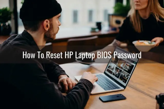 Using black laptop while on the desk