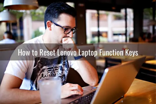 frustrated man looking at her laptop