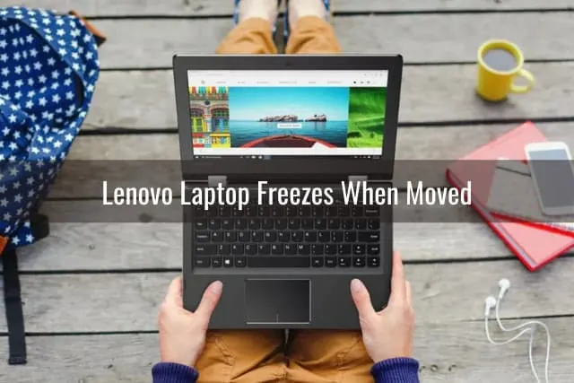 Black laptop on the lap