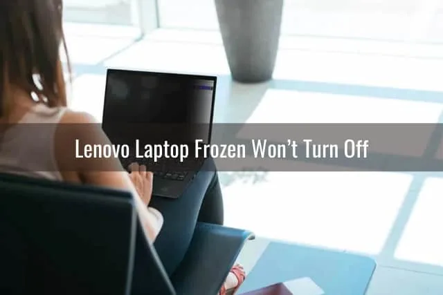 Black laptop on the lap