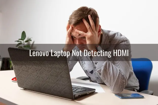 frustrated man looking at her laptop