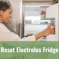 Woman opening the fridge