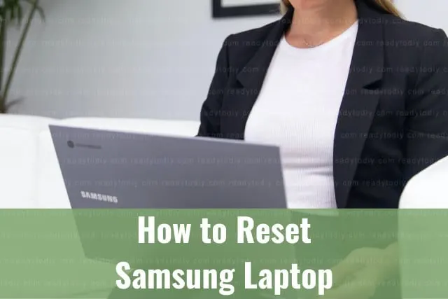 Using black laptop while on the desk