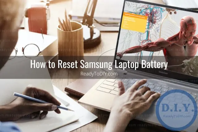 Using black laptop while on the desk