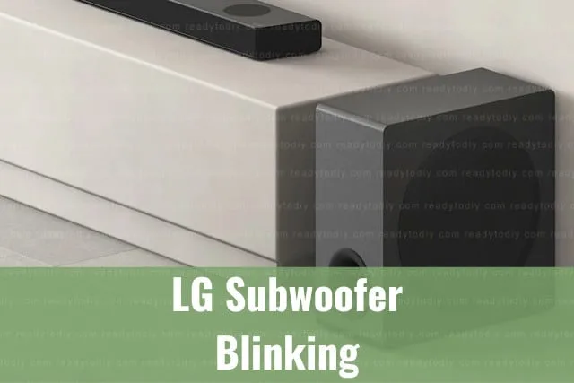 Black subwoofer below the TV