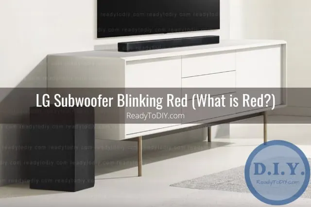 Black subwoofer below the TV