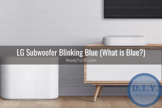 Black subwoofer below the TV