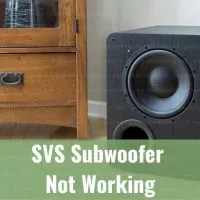 Black subwoofer on the floor