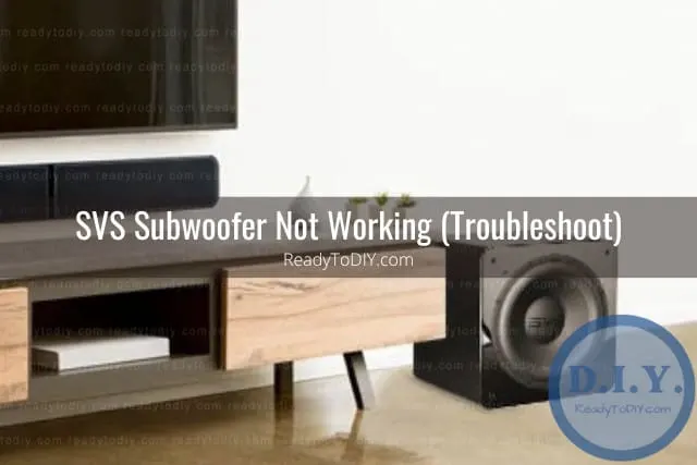 Black subwoofer on the floor