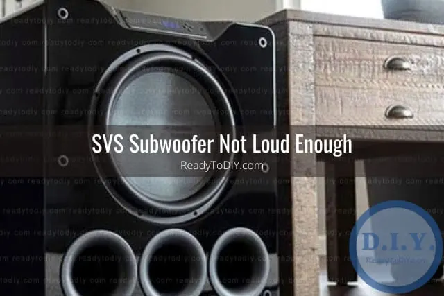 Black subwoofer on the floor