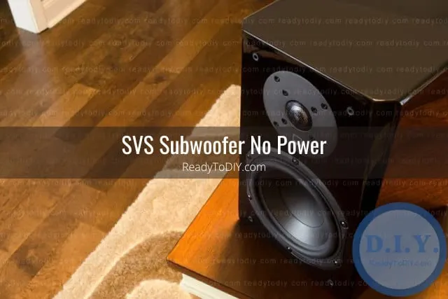 Black subwoofer on the floor