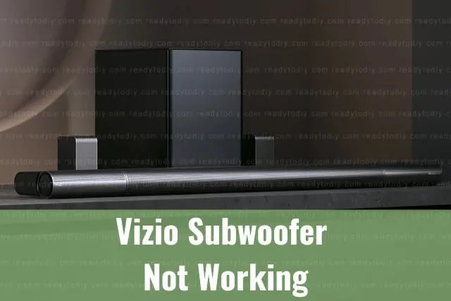 Black subwoofer below the tv