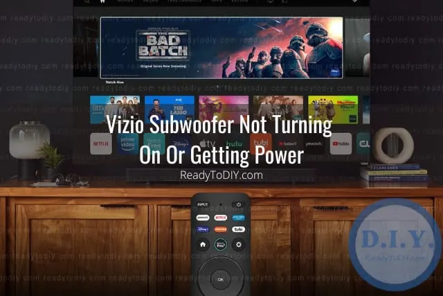 Black subwoofer below the tv
