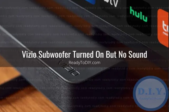 Black subwoofer below the tv