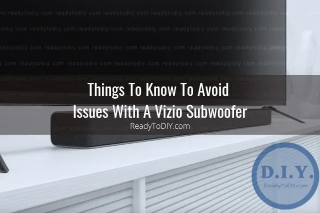 Black subwoofer below the tv